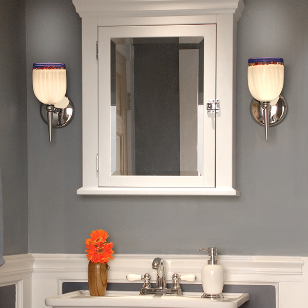 The Rosetta Wall Sconce from WAC Lighting’s European Collection on either side of a mirrored medicine cabinet. Bella figura, Rosetta offers fine Italian styles that combines a classic profile with multiple murine glass patterns that will enhance any setting with a perfect mix of form and function.