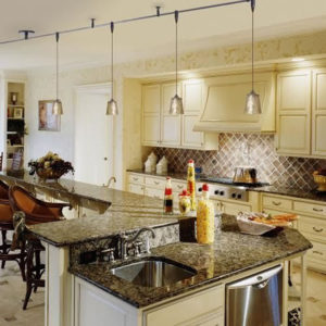 Besa Nico 4 Monorail Pendants in a traditional kitchen.