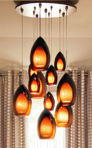 Line-Low 11-port canopy with Low Voltage Fire Pendants and Line Voltage Fire Grande Pendants