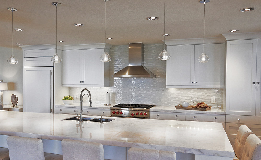 White Contemporary Kitchen with Tech Lighting Cheers Pendants, Undercabinet Lighting and Recessed Lighting