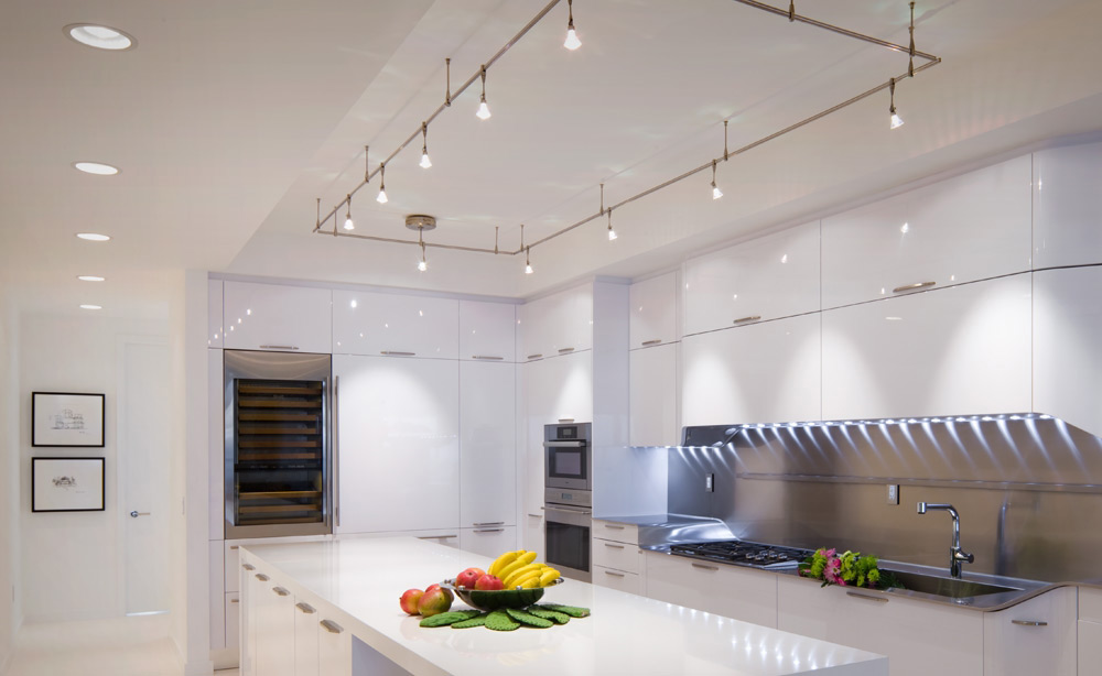 High Gloss White Modern Kitchen with Tech Lighting Monorail, Undercabinet Lighting and Recessed Lighting