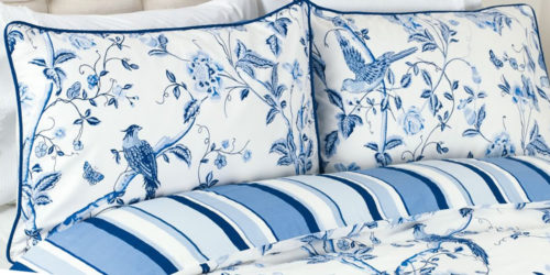 Laura Ashley Summer Palace has birds and flowers in royal blue against a white background.