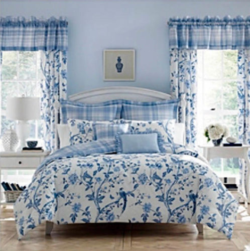 Laura Ashley Summer Palace has birds and flowers in royal blue against a white background.