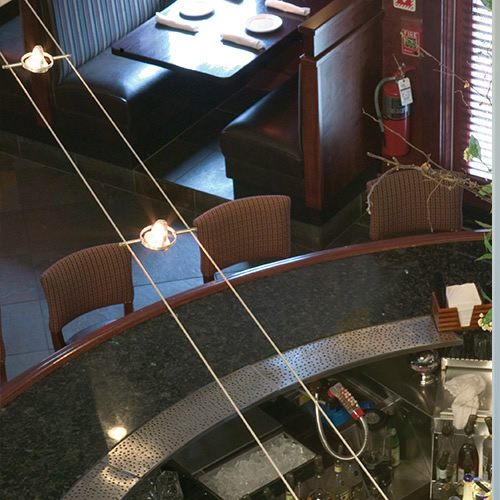 Looking down on K-Hello cable lights. This installation is in a restaurant. - DIY Guide to Buying and Designing Cable Light – My Design42