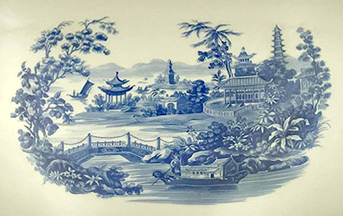 The motif in the center of the Pagoda Blue and Tea Service Tray