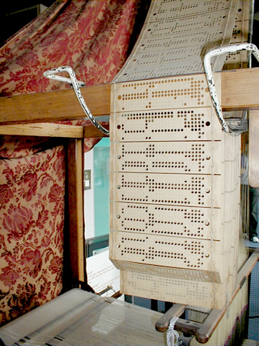 Punch Cards running through Jacquard Loom Museum of Science and Industry Manchester, England Photo by George Online