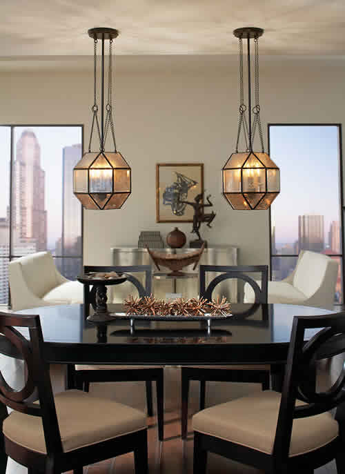 Two Sea Gull Lazlo Pendants in Mercury Glass over a dining room table