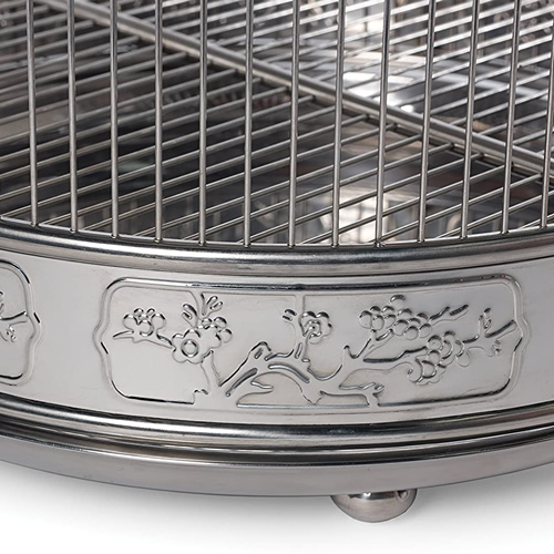 The decorative bottom on Prevue Pet Products Stainless Steel Bird Cages