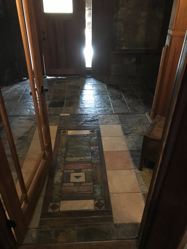 Tile floor with Chimayo weaving pattern