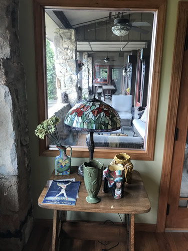 Looking through from the master bedroom enclosed porch to the open porch