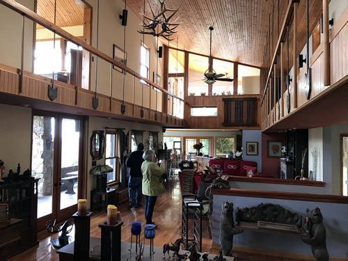 The open living room with catwalks above both sides