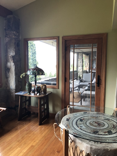 Sitting area on the enclosed porch off the master bedroom