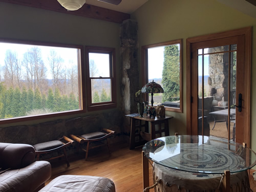 Sitting area on the enclosed porch off the master bedroom