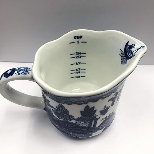 Blue Willow Measuring Cup with Cups and Ounces markings inside