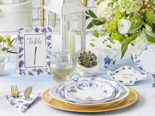 Kate Aspen Blue Willow Wedding Table Number, Paper Plates and napkin, Blue Willow Teapot Pretty Little Things Trinket Dish and a votive tea light holder in frosted glass with Blue Willow motifs